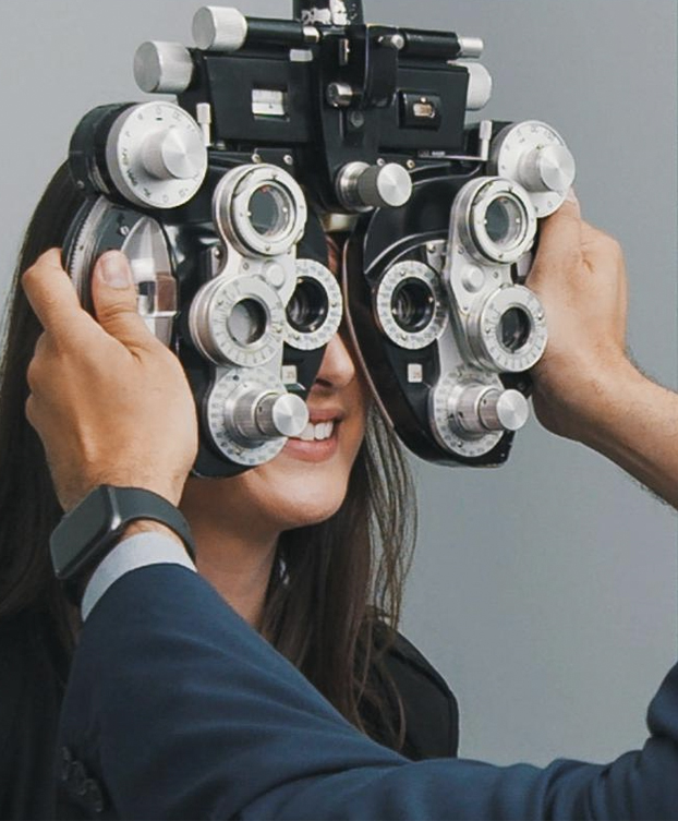 Woman getting eye exam